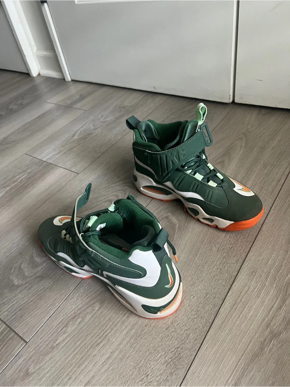 Nike Green Sneakers with Orange Accents
